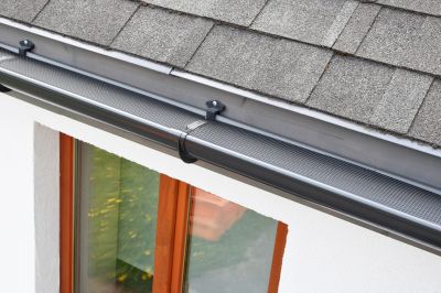 DIY vs Professional Gutter Cover Services